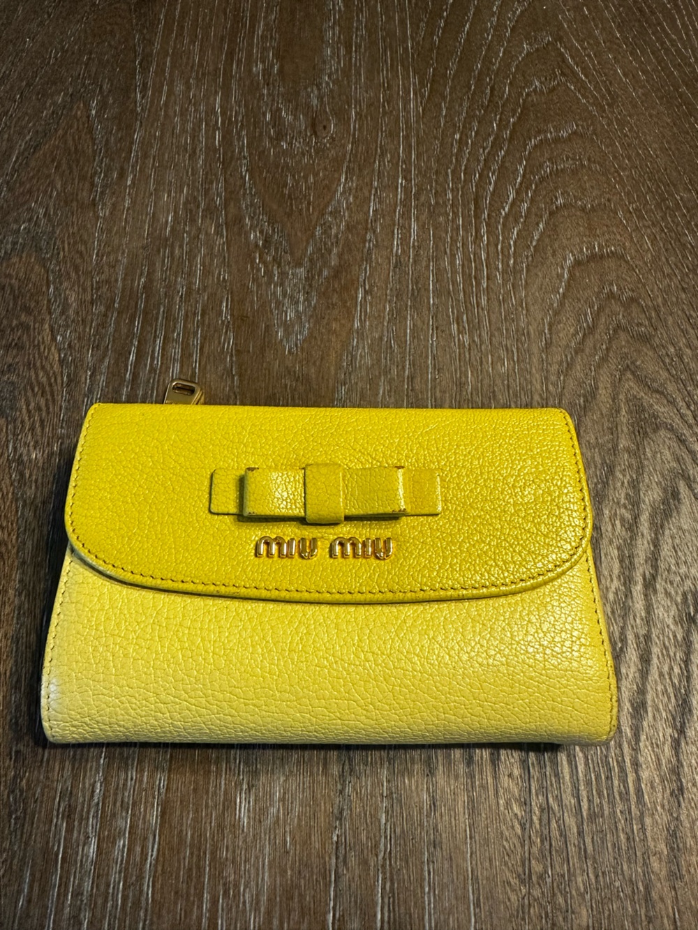 Very good condition Miu Miu Yellow Leather Women's Zip Wallet with Bow Accent